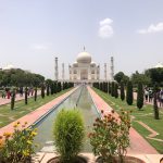 A captivating view of the Taj Mahal in Agra, showcasing its elegance and the surrounding gardens.